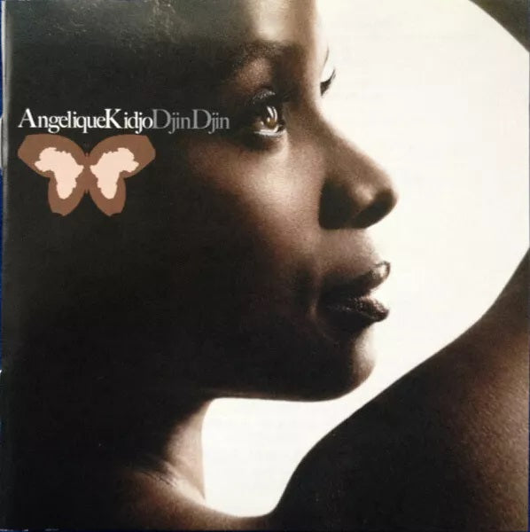 Close-up profile of a woman with a butterfly graphic and text 'Angelique Kidjo Djin Djin' on album cover