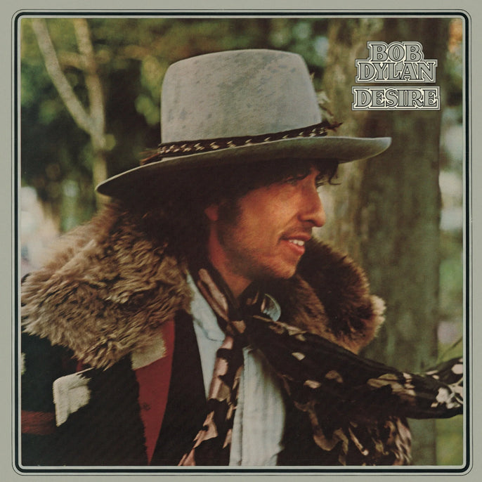 Bob Dylan Desire vinyl record album cover with fur coat and wide-brim hat