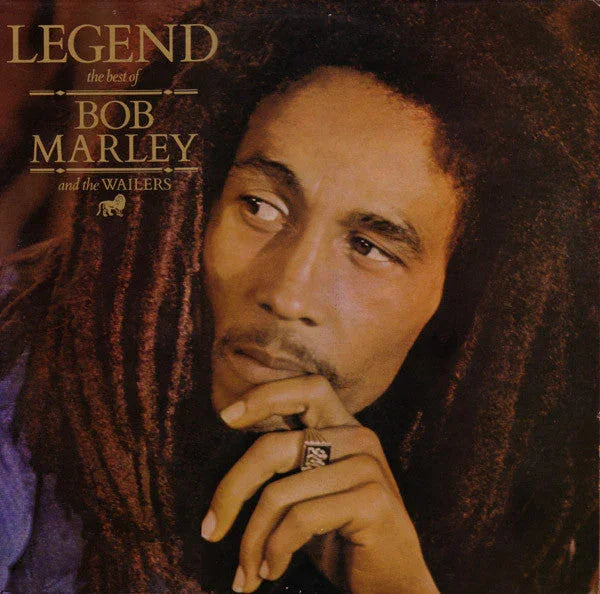 Legend album cover with contemplative man and reggae vinyl record title text