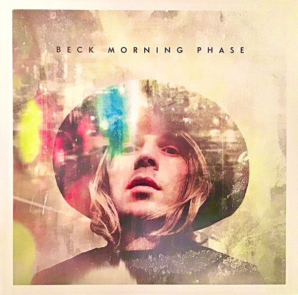 Beck Morning Phase album cover showing a portrait with colorful abstract light effects