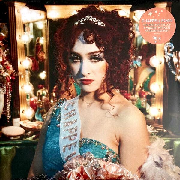 Chappell Roan The Rise and Fall of a Midwest Princess vinyl album cover, woman in teal dress with tiara and sash in glamorous dressing room.