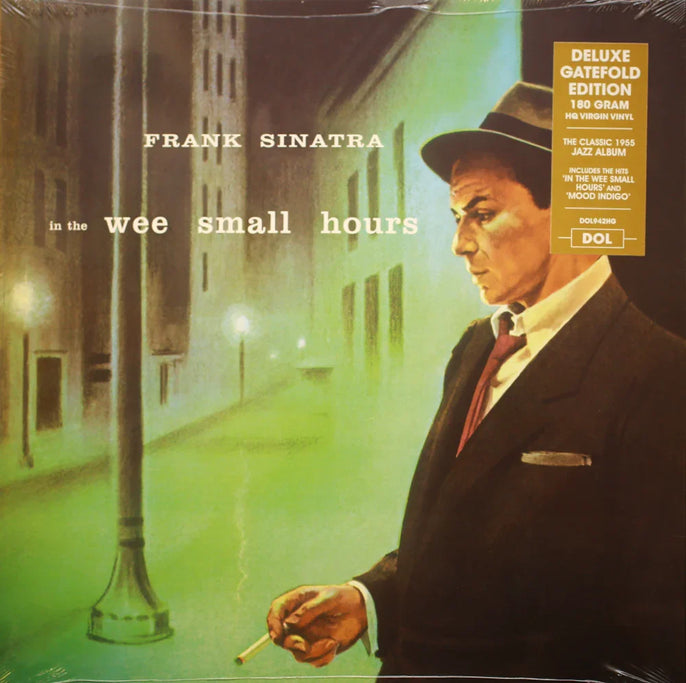 Frank Sinatra Wee Small Hours vinyl record album cover, illustrated city street at night, deluxe edition