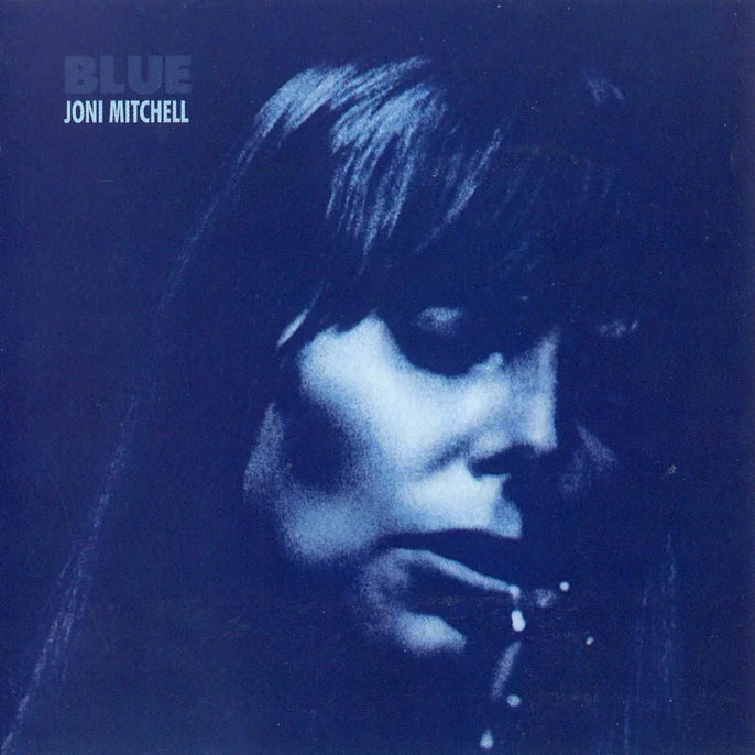 Joni Mitchell Blue album cover with close-up blue-tinted portrait and album title text
