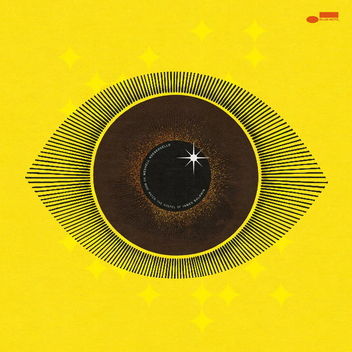 Abstract eye and starburst art on yellow vinyl record cover for Meshell Ndegeocello album.