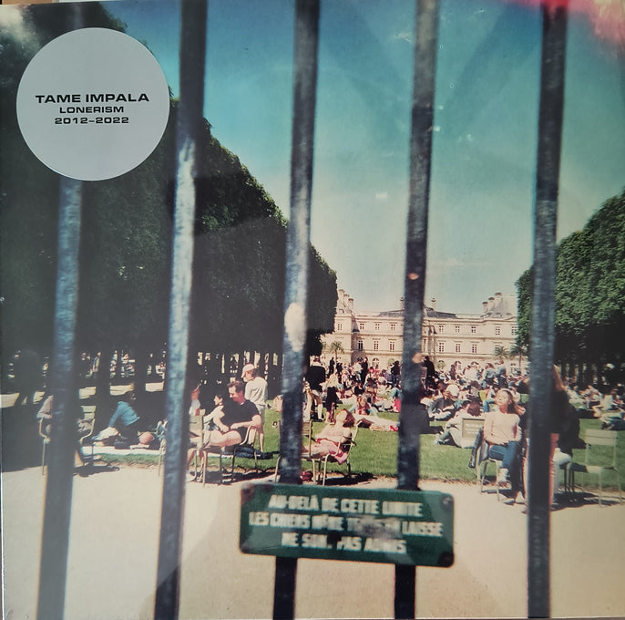 Tame Impala Lonerism album cover with park scene and metal fence, vinyl record art