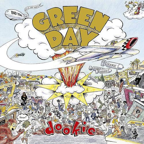 Green Day Dookie album cover with cartoon city, explosion, and jet, iconic punk rock vinyl.