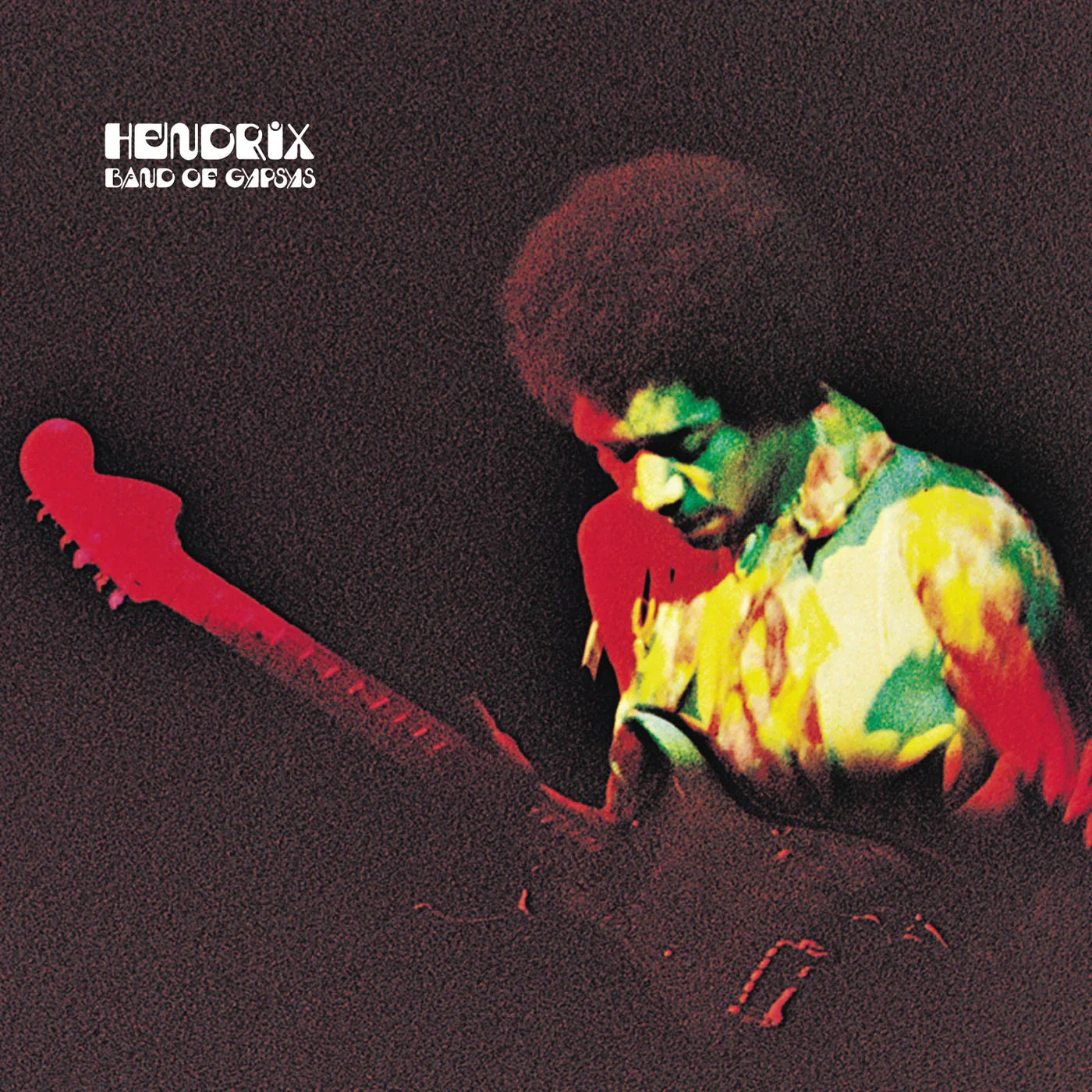A guitarist in colorful lighting plays an electric guitar on stage, with the text "Hendrix Band of Gypsys" in the top left corner.