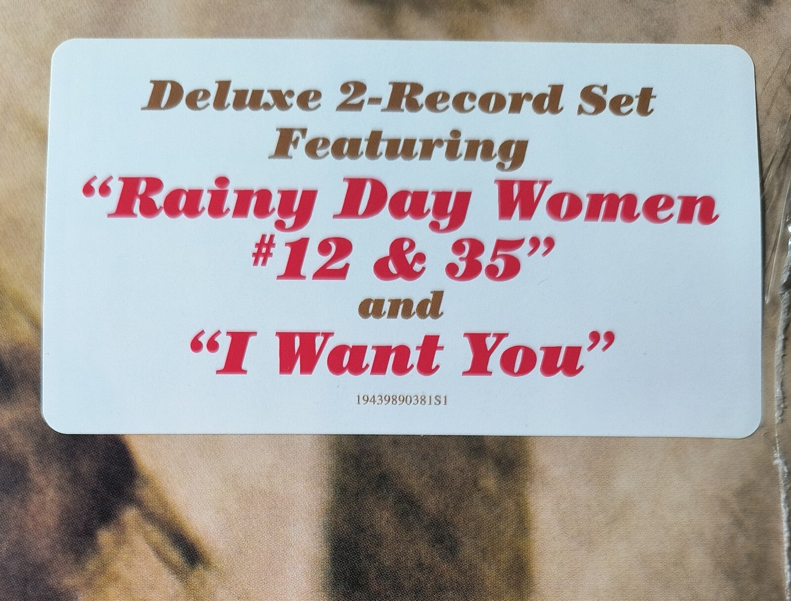 Deluxe 2-record vinyl set featuring Rainy Day Women #12 & 35 and I Want You sticker label.