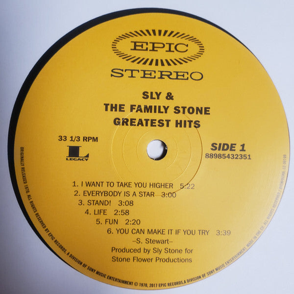 Sly & The Family Stone Greatest Hits vinyl record label, yellow with epic and tracklist visible.