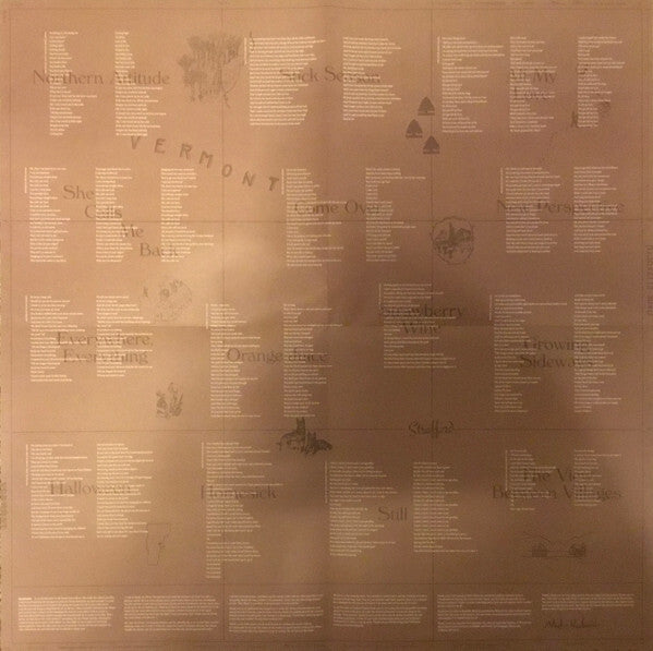Vinyl record lyric sheet with Vermont map background and song titles in organized columns.