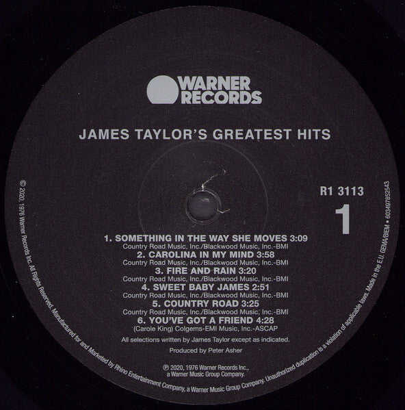 James Taylor's Greatest Hits vinyl record label featuring tracklist and Warner Records logo