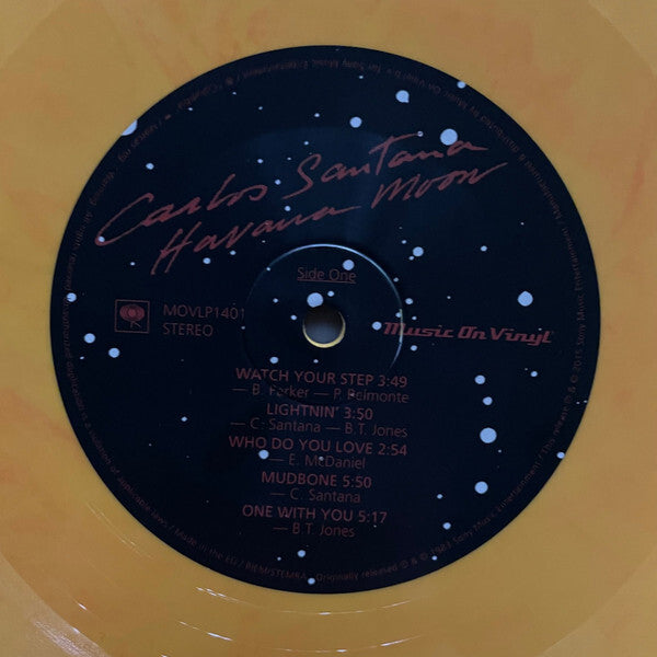 Carlos Santana Havana Moon yellow splatter vinyl record, side one tracklist visible