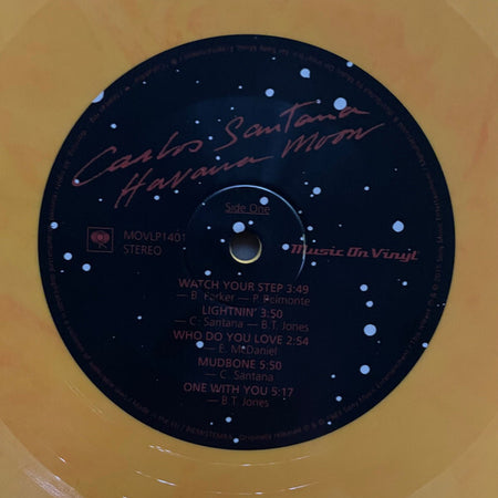 Carlos Santana Havana Moon yellow splatter vinyl record, side one tracklist visible