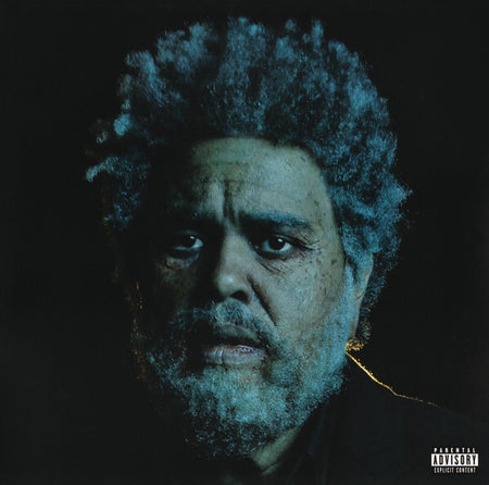 Close-up portrait of a man with gray hair and beard on a moody, dark album cover