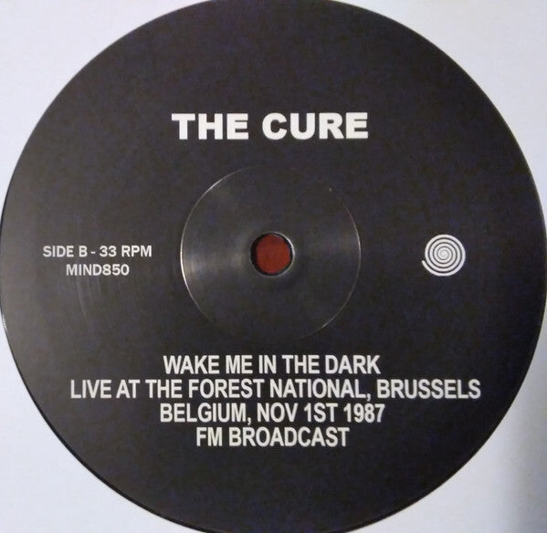 The Cure vinyl record label, Wake Me In The Dark, live Brussels 1987, black background.