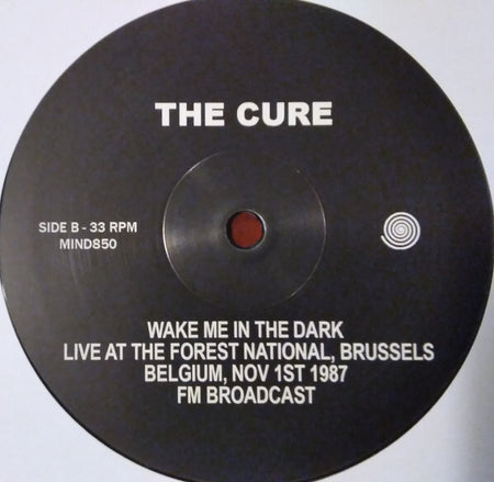The Cure vinyl record label, Wake Me In The Dark, live Brussels 1987, black background.