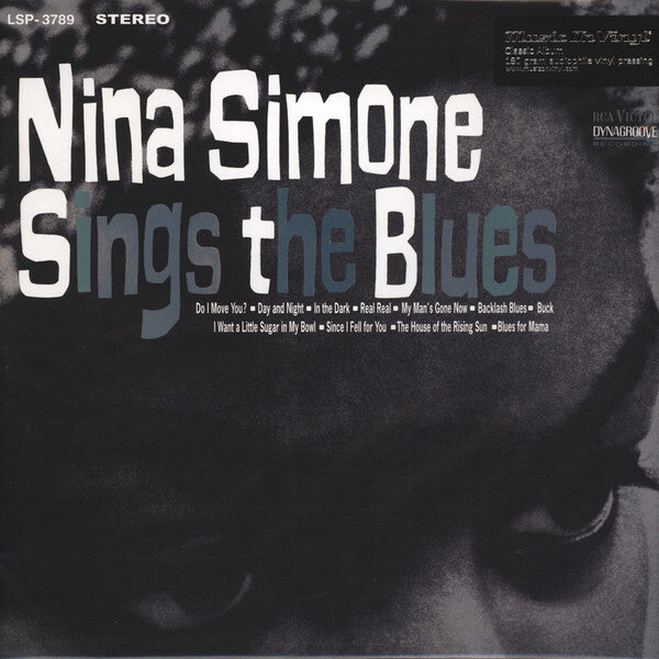 Nina Simone Sings the Blues vinyl record album cover with bold white and blue text.