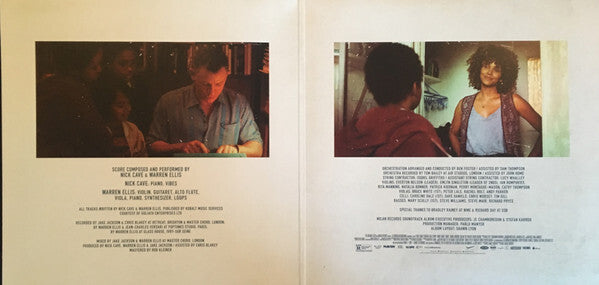 Vinyl record gatefold with two movie stills, cast and music credits, and a diverse cast.