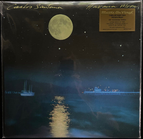 Carlos Santana Havana Moon vinyl record cover with full moon night sky and ocean reflection