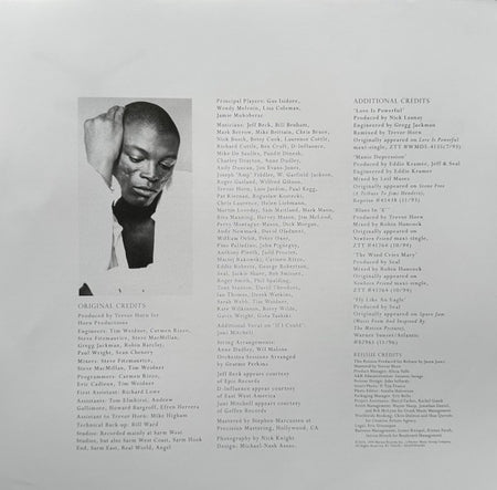 Monochrome album credits insert with black-and-white portrait of a man and detailed musician credits.