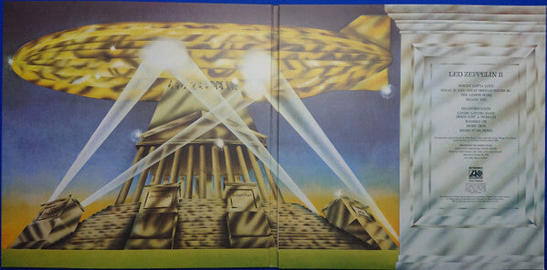 Led Zeppelin II vinyl record gatefold with airship, stone monument, and tracklist display