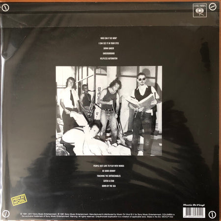 Back cover of a vinyl record featuring a black and white band photo, song list, and Columbia Records logos.
