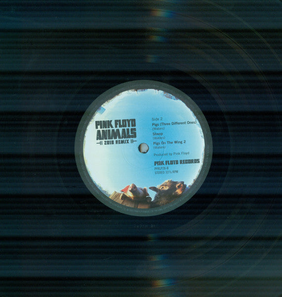 Pink Floyd Animals 2018 remix vinyl record with album label and animal illustration