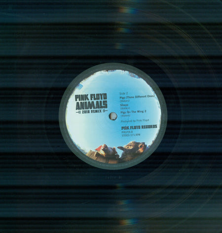 Pink Floyd Animals 2018 remix vinyl record with album label and animal illustration