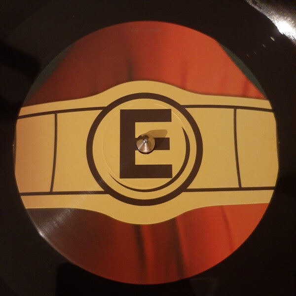 Vinyl record with a label featuring a bold letter E in a championship belt design