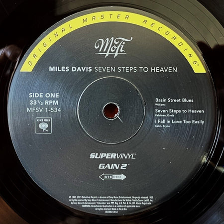 Miles Davis Seven Steps to Heaven vinyl record, side one label, jazz album classic.