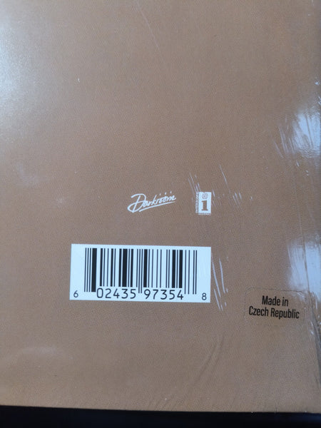 Rear cover of a vinyl record with barcode, made in Czech Republic, brown background