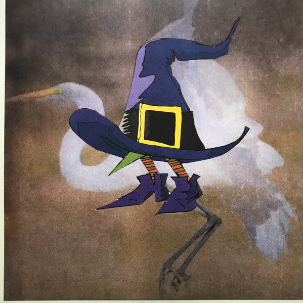 White egret in background with a whimsical witch hat and boots illustration overlay