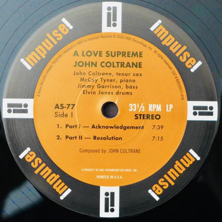 A Love Supreme John Coltrane vinyl record label with tracklist and Impulse Records logo