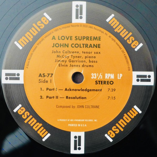 A Love Supreme John Coltrane vinyl record label with tracklist and Impulse Records logo