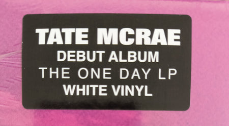 Tate McRae debut album The One Day LP white vinyl sticker on pink background