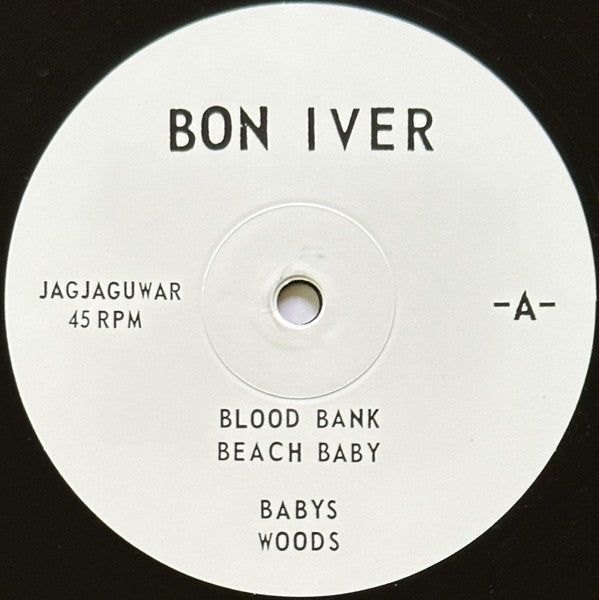Bon Iver Blood Bank vinyl record label with song titles and tracklist closeup