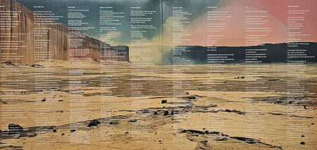 Vinyl record album gatefold with desert landscape artwork, song lyrics overlaid, classic music collectible
