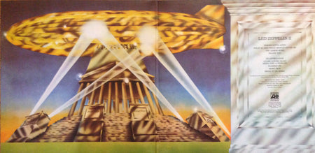 Vinyl record album artwork with golden airship, beams of light over ancient monument, and song list.