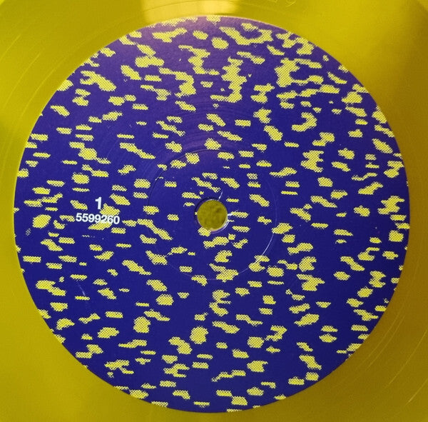 Yellow translucent vinyl record with blue and yellow abstract spotted center label