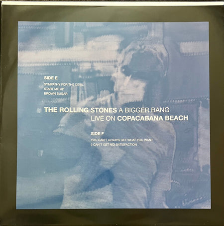 The Rolling Stones A Bigger Bang Live on Copacabana Beach vinyl record cover, blue-toned with text and band performance image.