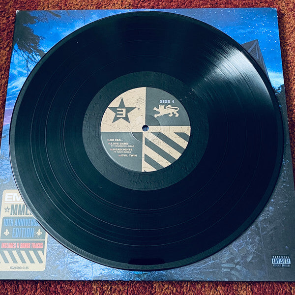 Vinyl record on album cover, side 4 label with tracklist, 10th anniversary edition sticker