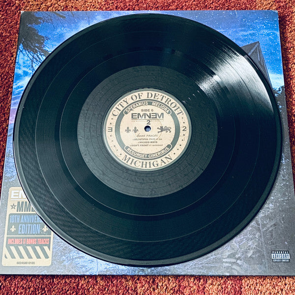 Eminem 10th anniversary vinyl record for The Marshall Mathers LP resting on album cover