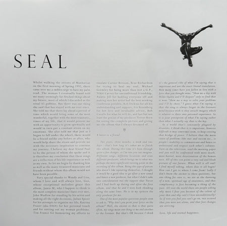 SEAL album insert page featuring artist's name, black and white text, and small sculpture image