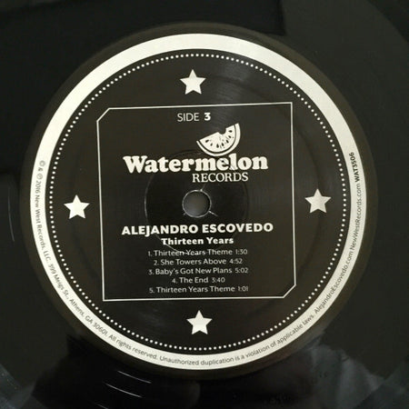 Alejandro Escovedo Thirteen Years vinyl record label by Watermelon Records, tracklist visible.