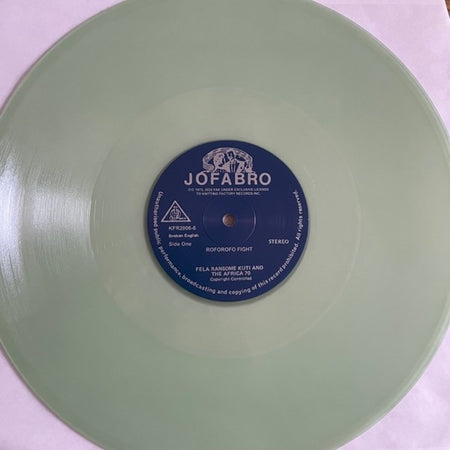 Mint green vinyl record labeled Jofabro, Fela Kuti, Roforofo Fight, Afrobeat music LP.