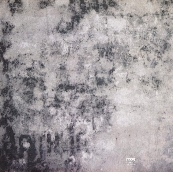 Vintage vinyl record cover with abstract textured gray and black marbled pattern