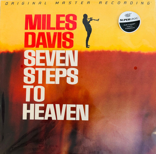Miles Davis Seven Steps to Heaven vinyl record cover with trumpet silhouette, jazz album art
