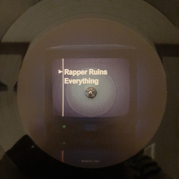 Vinyl record with label reading 'Rapper Ruins Everything' in bold white text