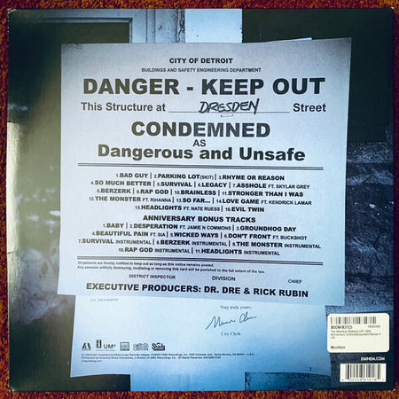 Vinyl record back cover with Detroit danger condemned sign, album tracklist, and executive producer credits.