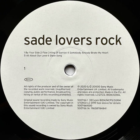 Sade Lovers Rock vinyl record label with tracklist and copyright details.